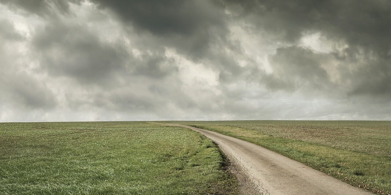 stormy sky non descript rural road