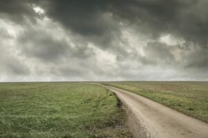 stormy sky non descript rural road